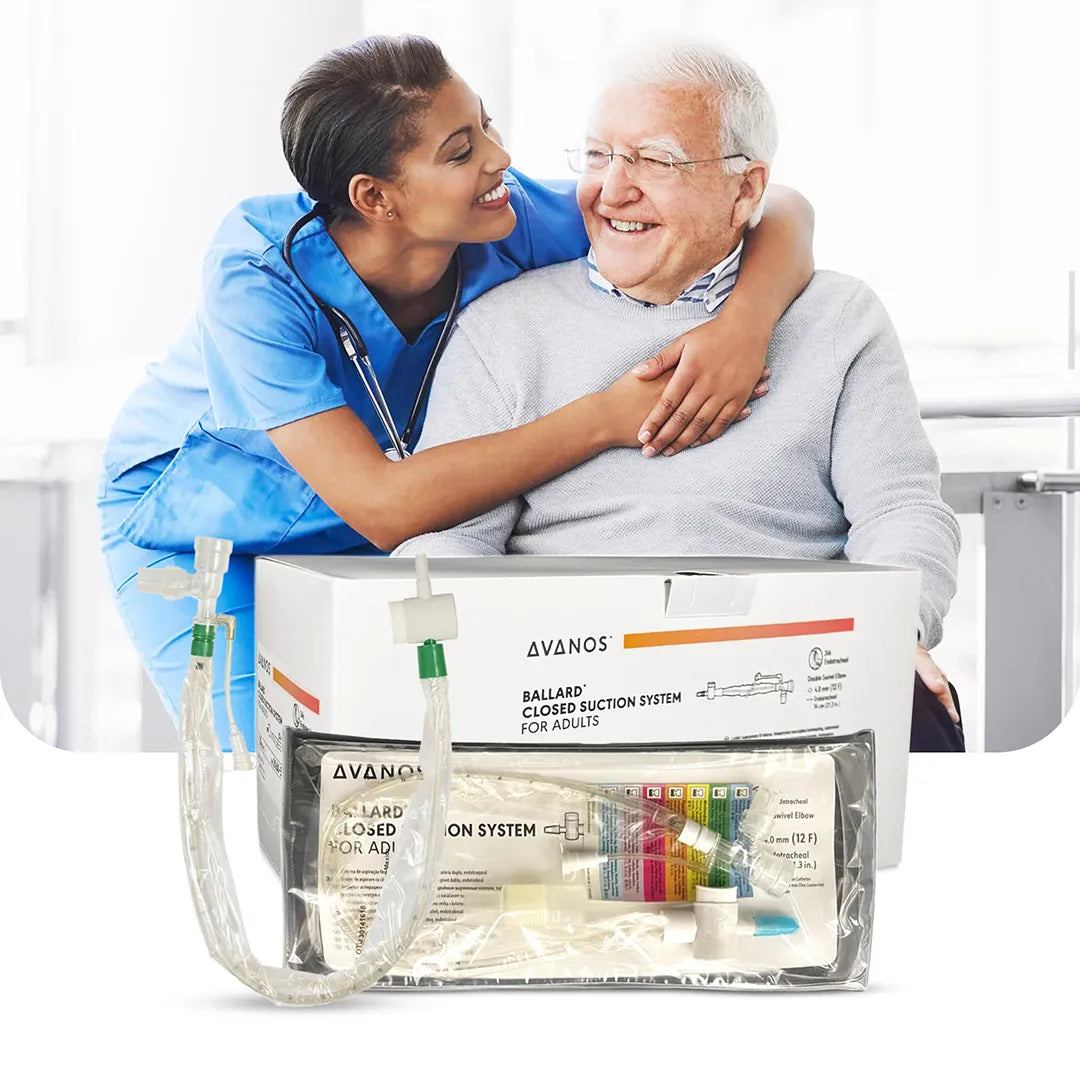 Nurse embracing elderly patient with AVANOS BALLARD Standard Closed Suction System for adults displayed in foreground, available at Medisa.