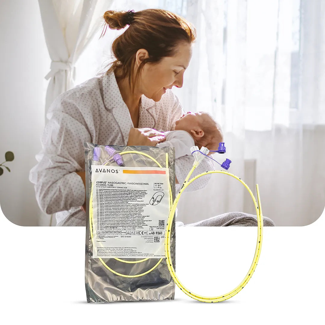 Mother holding infant beside Avanos CORFLO Nasogastric/NasoIntestinal Feeding Tube package, showing ENFit-compatible yellow NG/NI tube, available at Medisa.