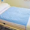 Smart Barrier Bed Pad with waterproof backing with tuck in